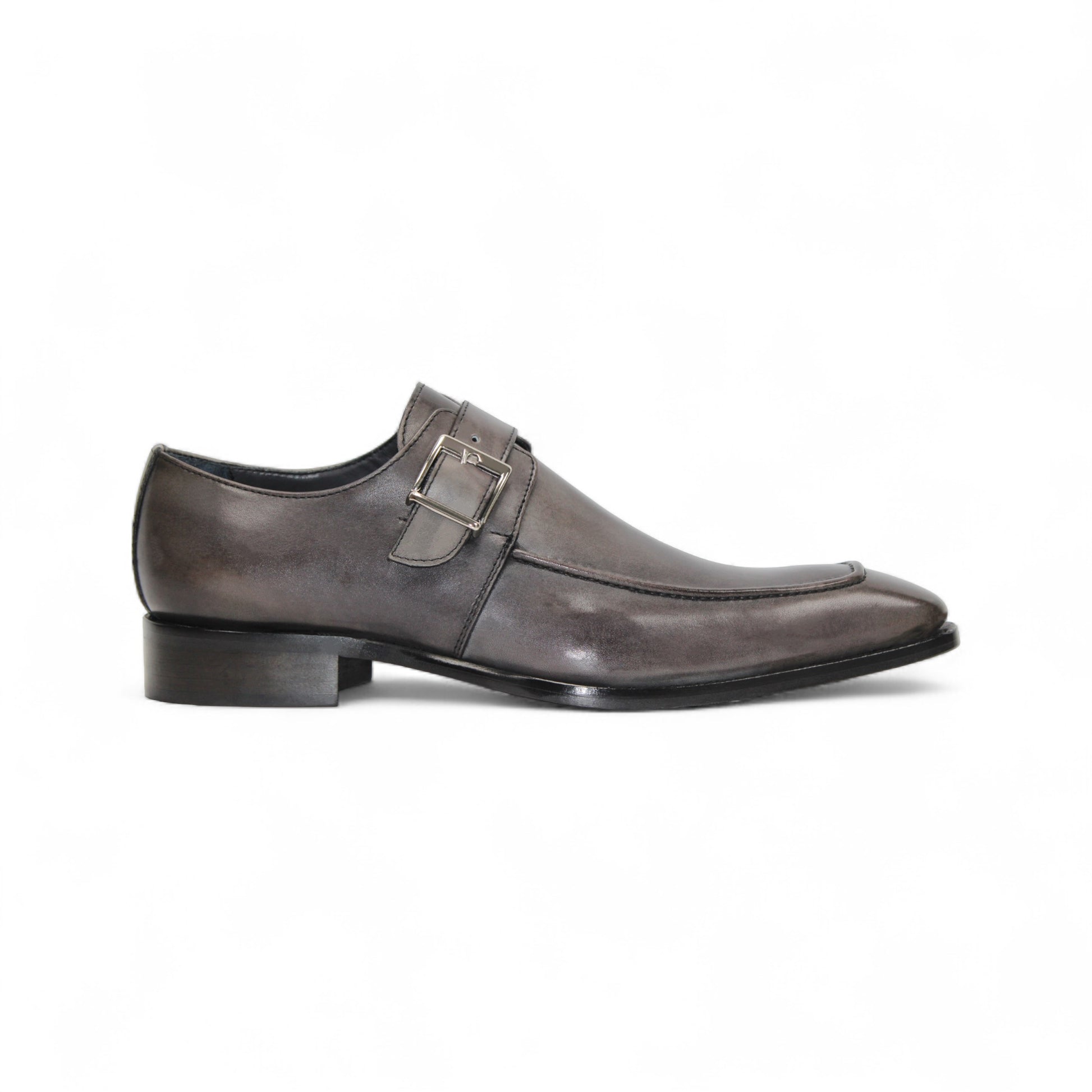 The Duca Di Matiste Duca Garda Grey—a genuine leather dress shoe with pointed toe, low heel, and side buckle—is an elegant choice for any modern wardrobe, shown here in gray on a white background.
