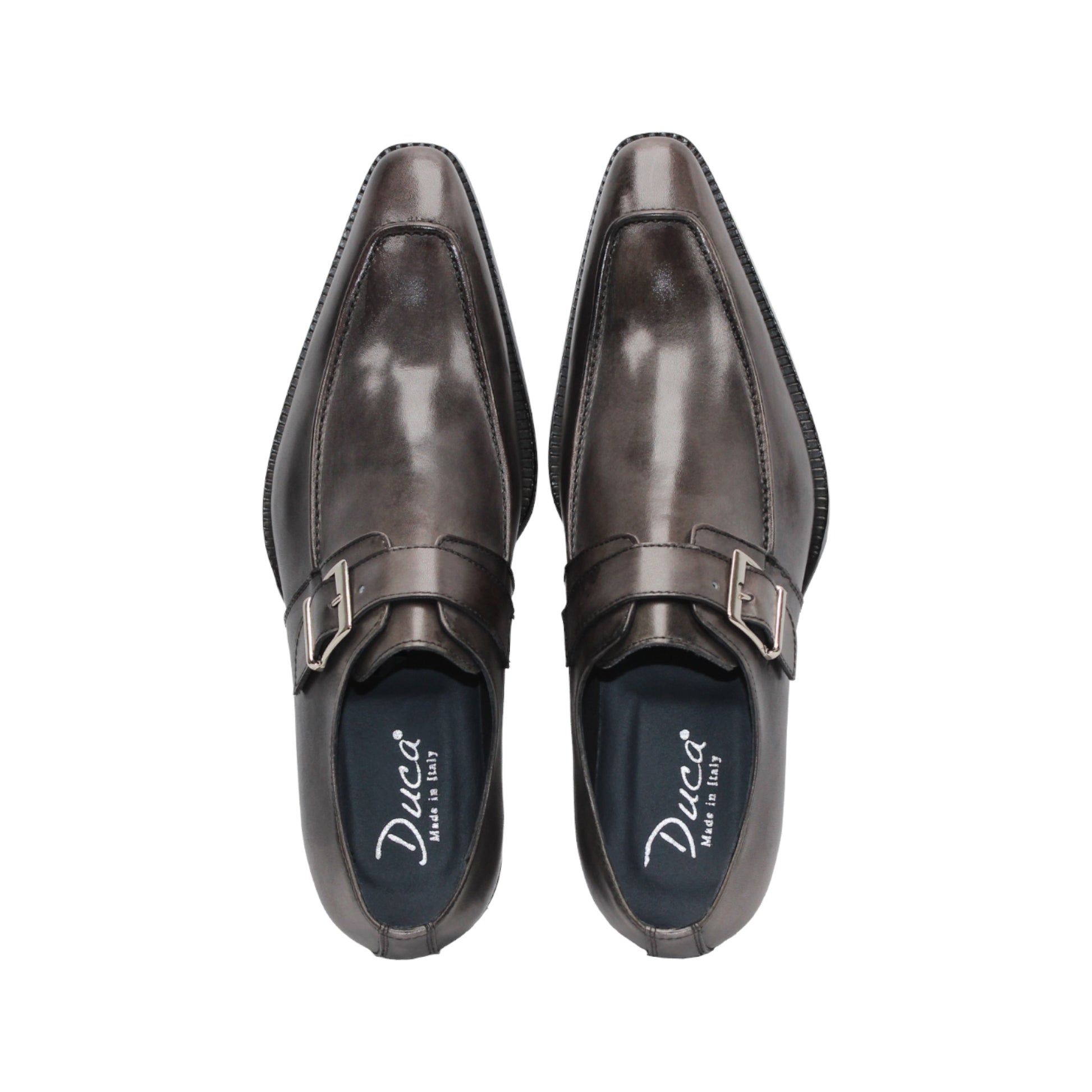 The Duca Di Matiste Duca Garda Grey—a genuine leather dress shoe with pointed toe, low heel, and side buckle—is an elegant choice for any modern wardrobe, shown here in gray on a white background.