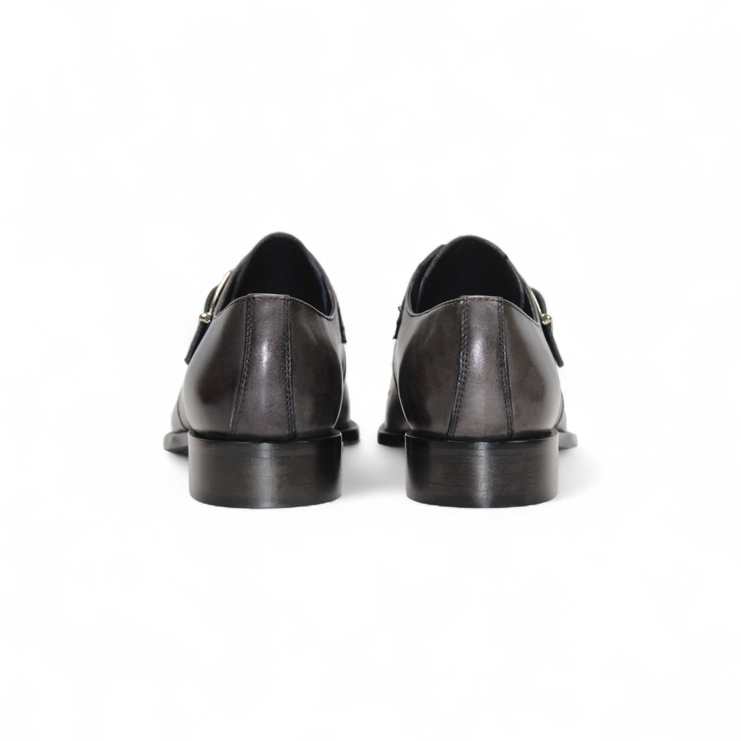 The Duca Di Matiste Duca Garda Grey—a genuine leather dress shoe with pointed toe, low heel, and side buckle—is an elegant choice for any modern wardrobe, shown here in gray on a white background.