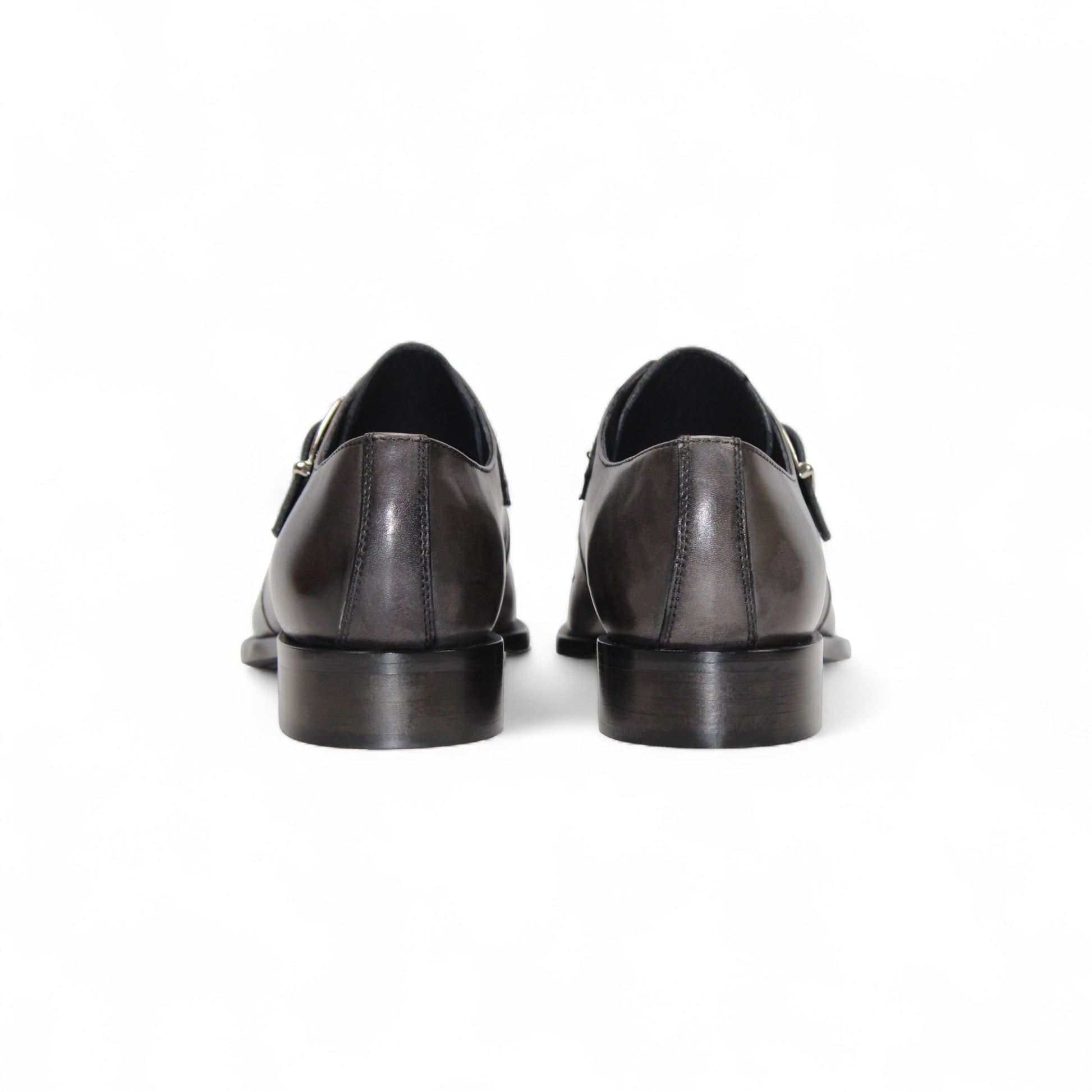 The Duca Di Matiste Duca Garda Grey—a genuine leather dress shoe with pointed toe, low heel, and side buckle—is an elegant choice for any modern wardrobe, shown here in gray on a white background.