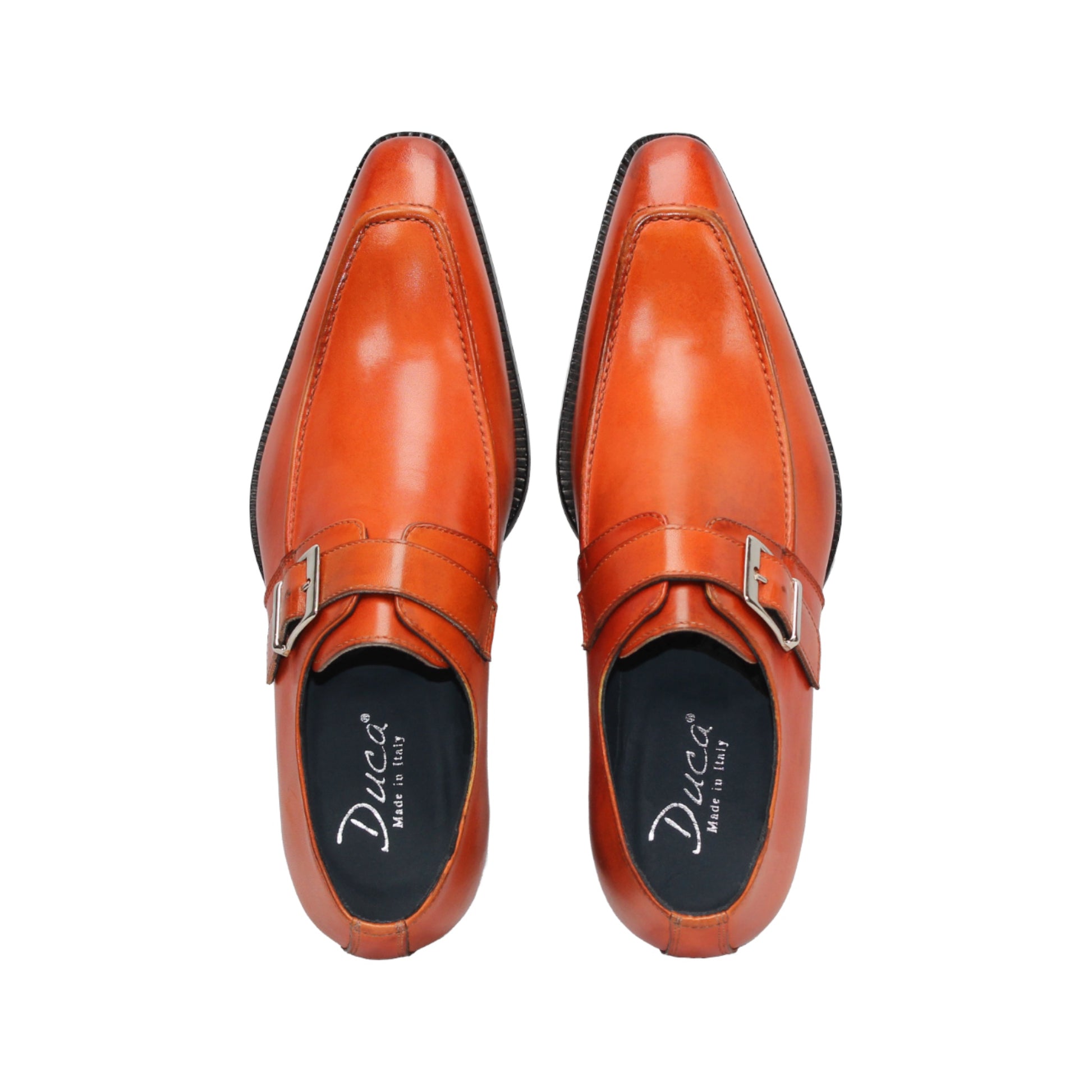The Duca Di Matiste Duca Garda Orange dress shoe, crafted from genuine leather with a side buckle and low black heel, is shown in profile on a white background—a refined, modern wardrobe addition.