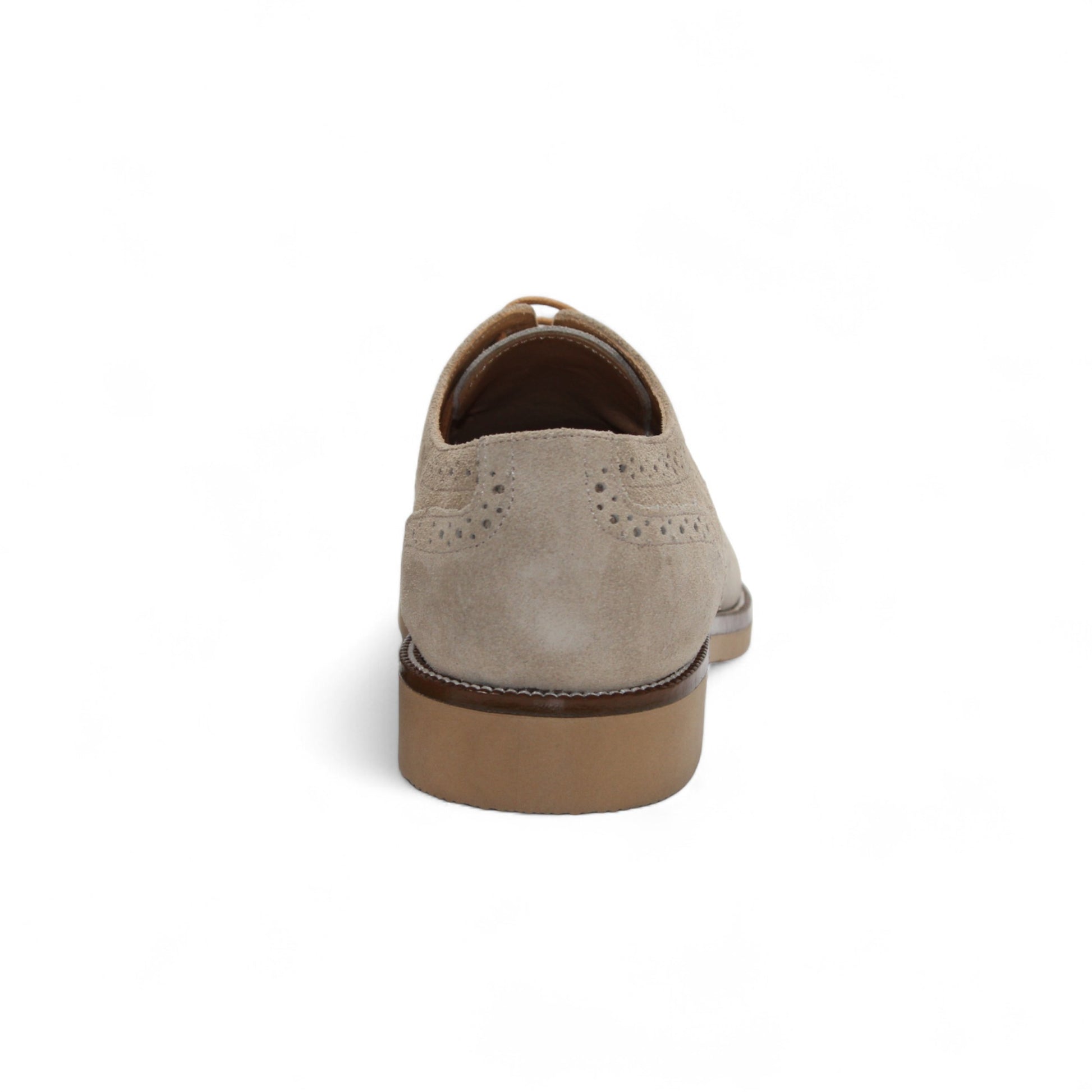 The Firmani George Beige is an Italian suede Oxford shoe with brogue detailing, brown laces, and a comfy rubber sole by Firmani, shown in side profile on a white background.