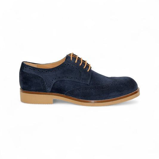 The Firmani George Navy by Firmani is a stylish Italian suede oxford with tan laces and a light brown sole, shown against a white background.