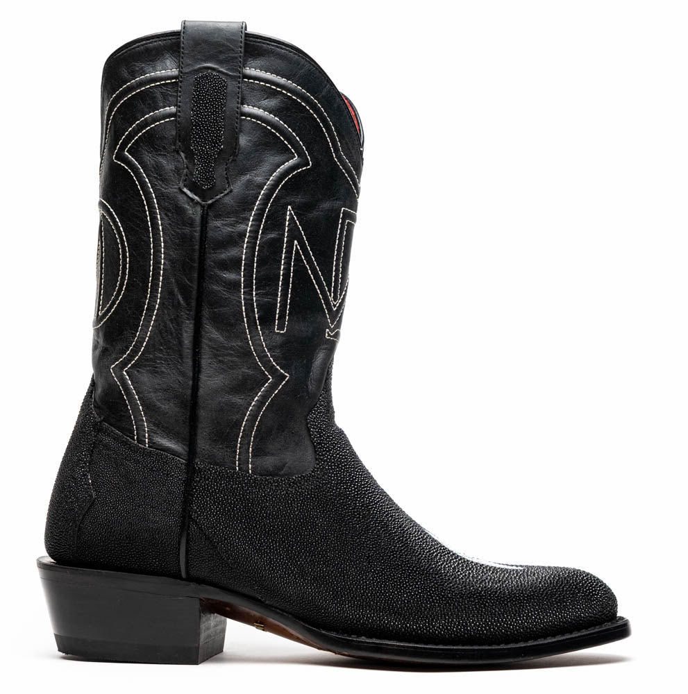 A pair of Georgia Black handcrafted western boots by Marco Di Milano, featuring white stitching—one boot upright and the other on its side displaying the branded sole.