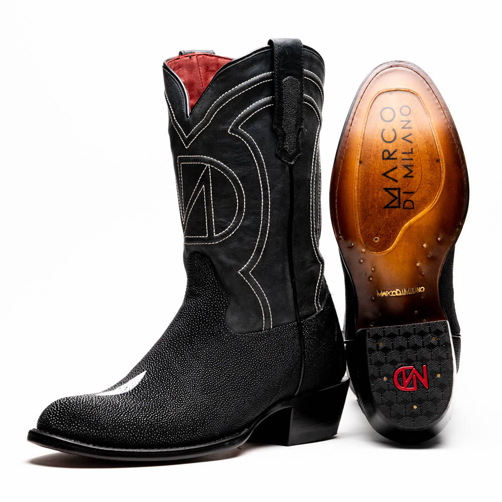A pair of Georgia Black handcrafted western boots by Marco Di Milano, featuring white stitching—one boot upright and the other on its side displaying the branded sole.