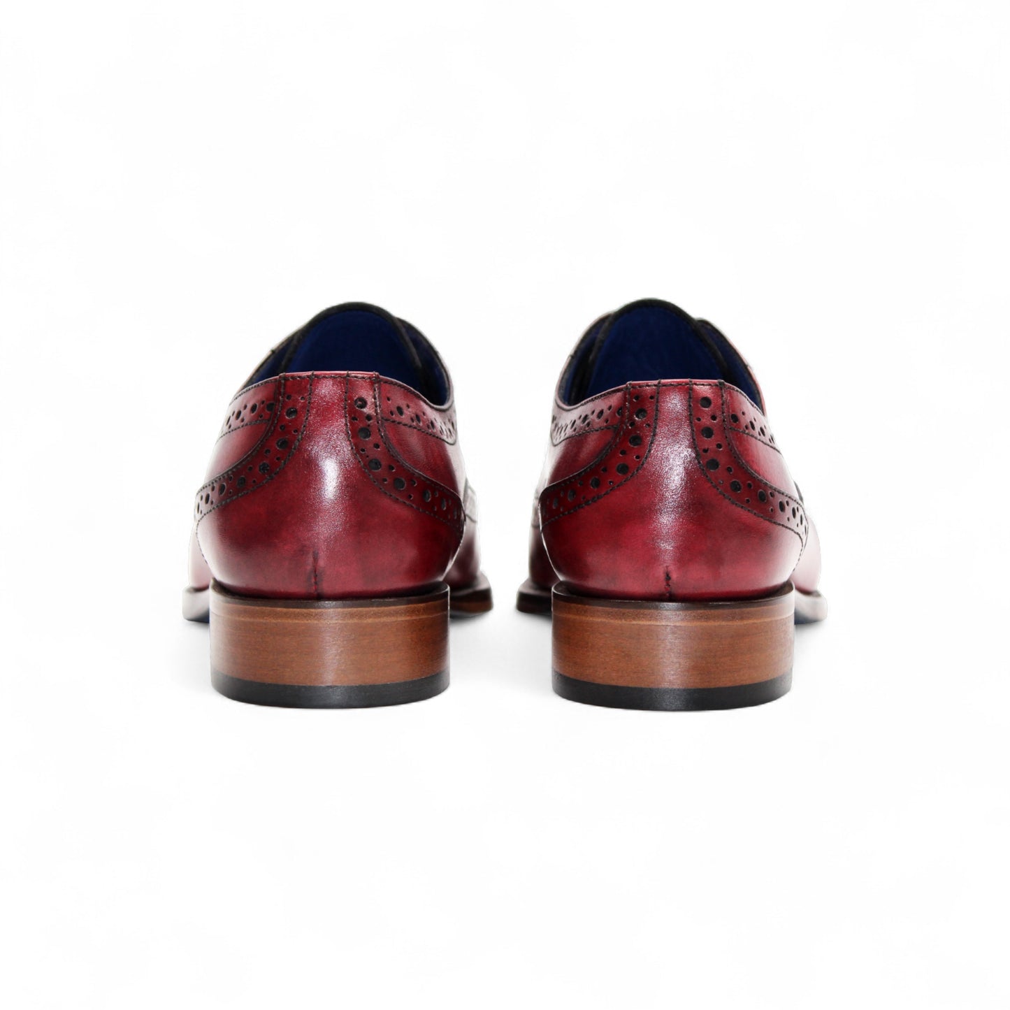 The Emilio Franco Giacamo Antique Red by Emilio Franco is a men's dress shoe in red genuine leather with black laces, brogue details, and a wooden heel, displayed in profile on a white background.