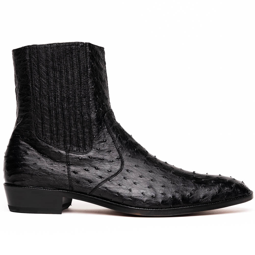 The Marco Di Milano Giorgio Black is a pair of luxury dress boots in genuine ostrich quill leather, showcasing a black ankle design, side zippers, brown leather soles, and visible sole branding—one boot upright, one on its side.
