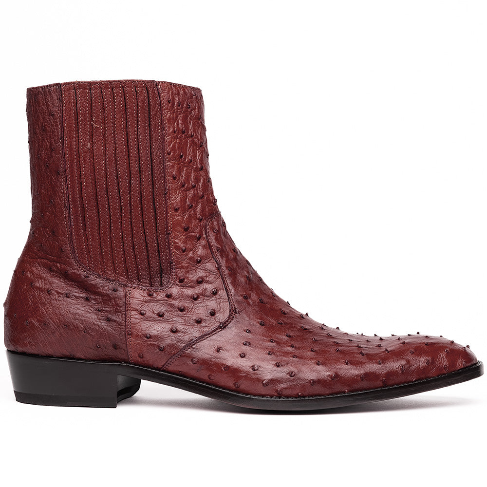 Introducing Giorgio Wine by Marco Di Milano: a pair of luxurious men's boots handcrafted in genuine burgundy ostrich leather, featuring a distinctive textured pattern, side zipper, elastic panel, and a sleek black sole—sophisticatedly presented against a white background.