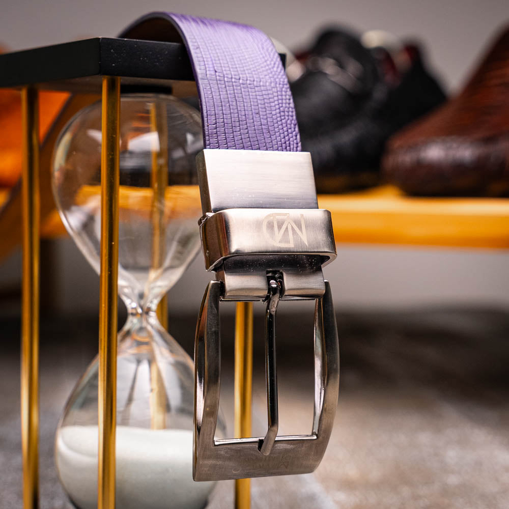 The Giovanni Belt Purple by Marco Di Milano features a sleek silver buckle and elegant caiman belly leather.