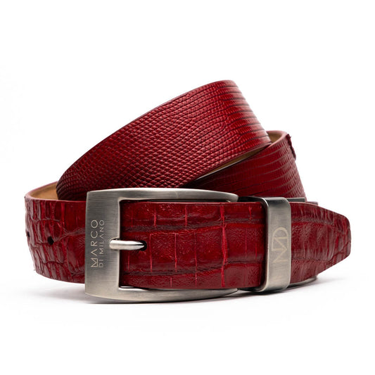 The Giovanni Belt Red by Marco Di Milano is a rolled red leather belt with a textured finish and a silver buckle, reflecting the refined style of genuine lizard ring-caiman belly belts.