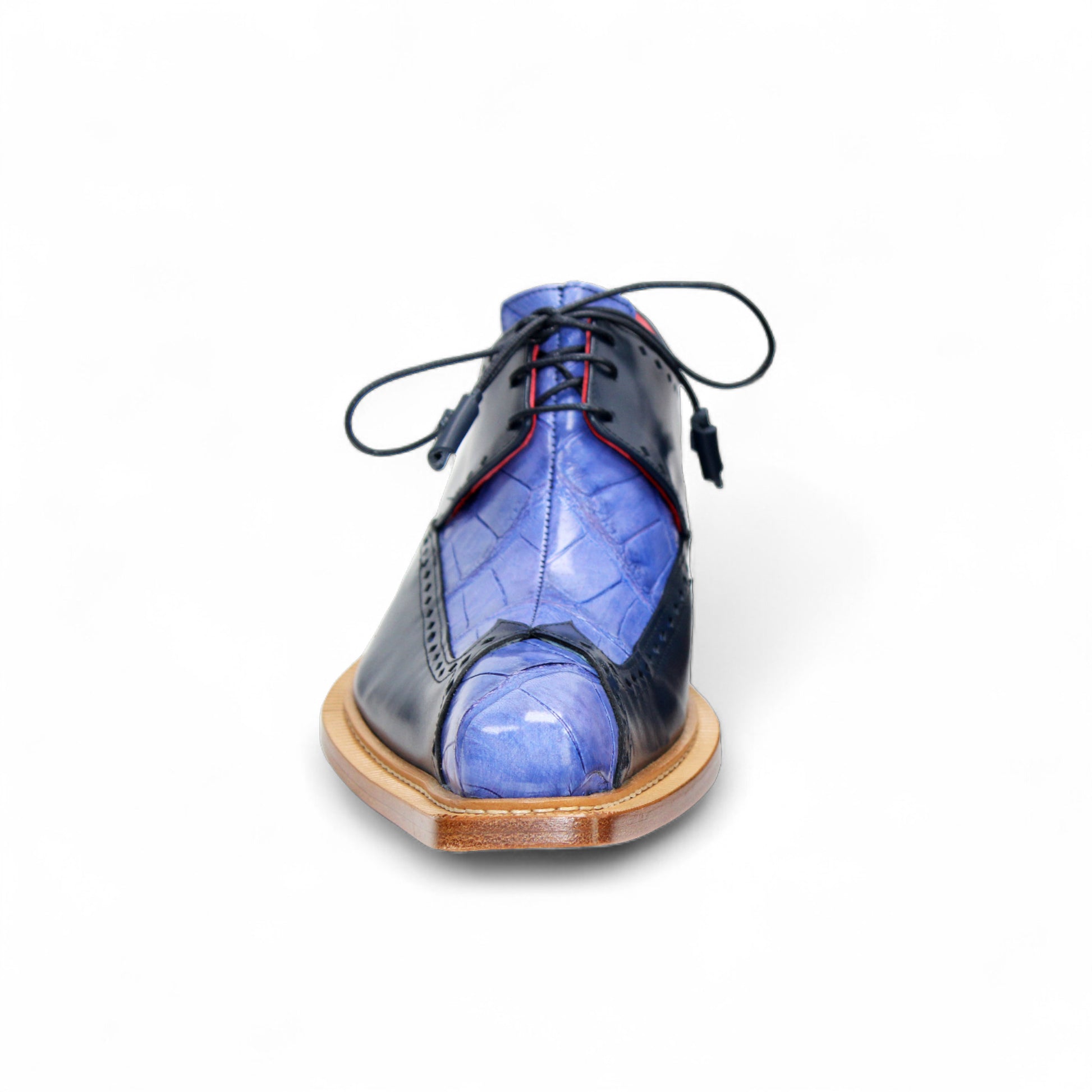A single Fennix Harry Light Blue/Navy men’s dress shoe by Fennix of Italy, featuring a premium blue leather upper, wooden sole, black laces, and squared toe—shown in side profile to highlight Italian craftsmanship.