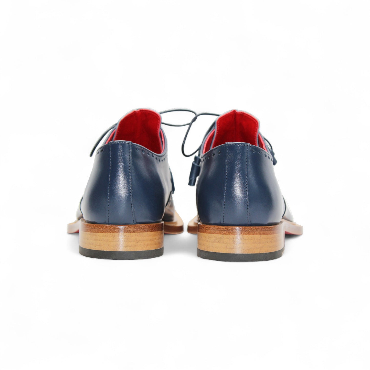 A single Fennix Harry Light Blue/Navy men’s dress shoe by Fennix of Italy, featuring a premium blue leather upper, wooden sole, black laces, and squared toe—shown in side profile to highlight Italian craftsmanship.