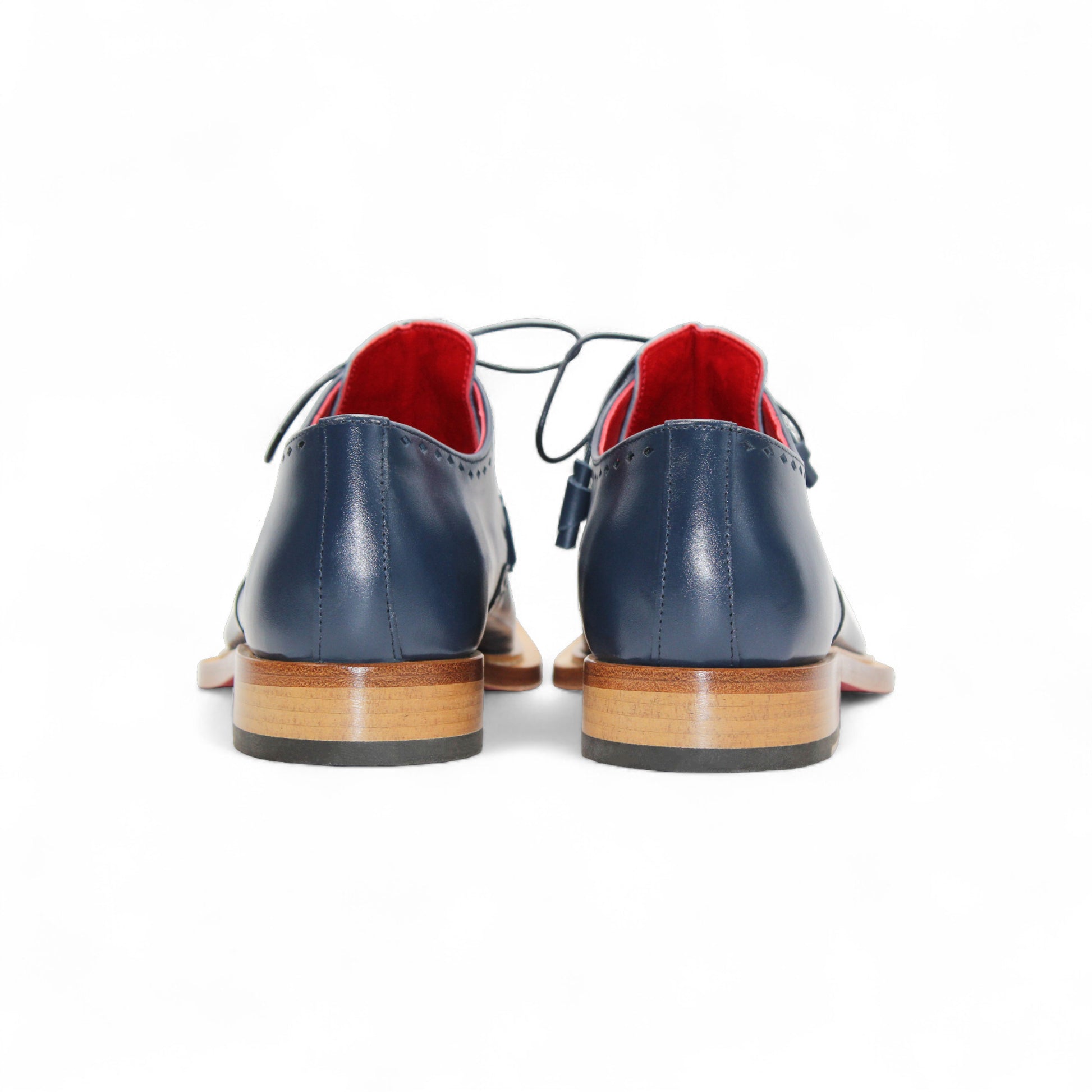 A single Fennix Harry Light Blue/Navy men’s dress shoe by Fennix of Italy, featuring a premium blue leather upper, wooden sole, black laces, and squared toe—shown in side profile to highlight Italian craftsmanship.