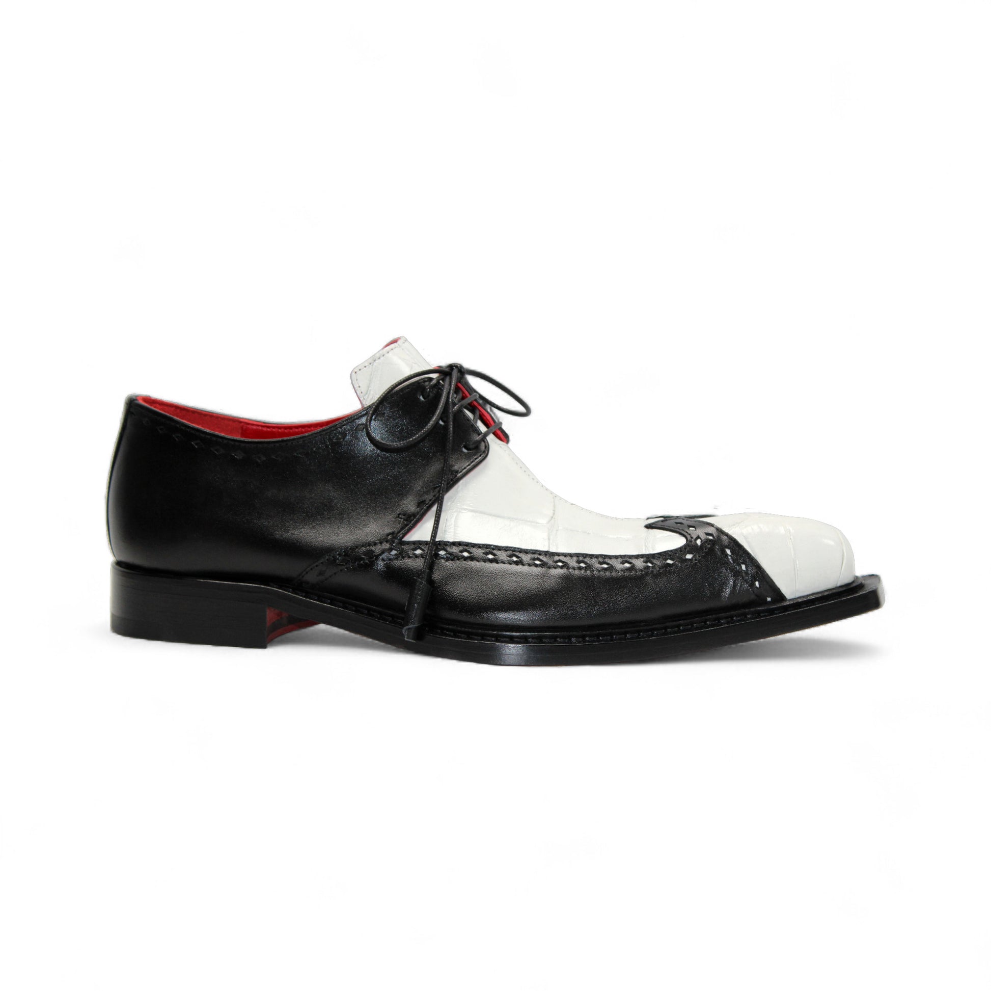 The Fennix Harry White/Black by Fennix of Italy is a leather dress shoe with black and white panels, laces, a leather sole, low heel, and red inner lining, highlighting Italian craftsmanship in profile on a white background.
