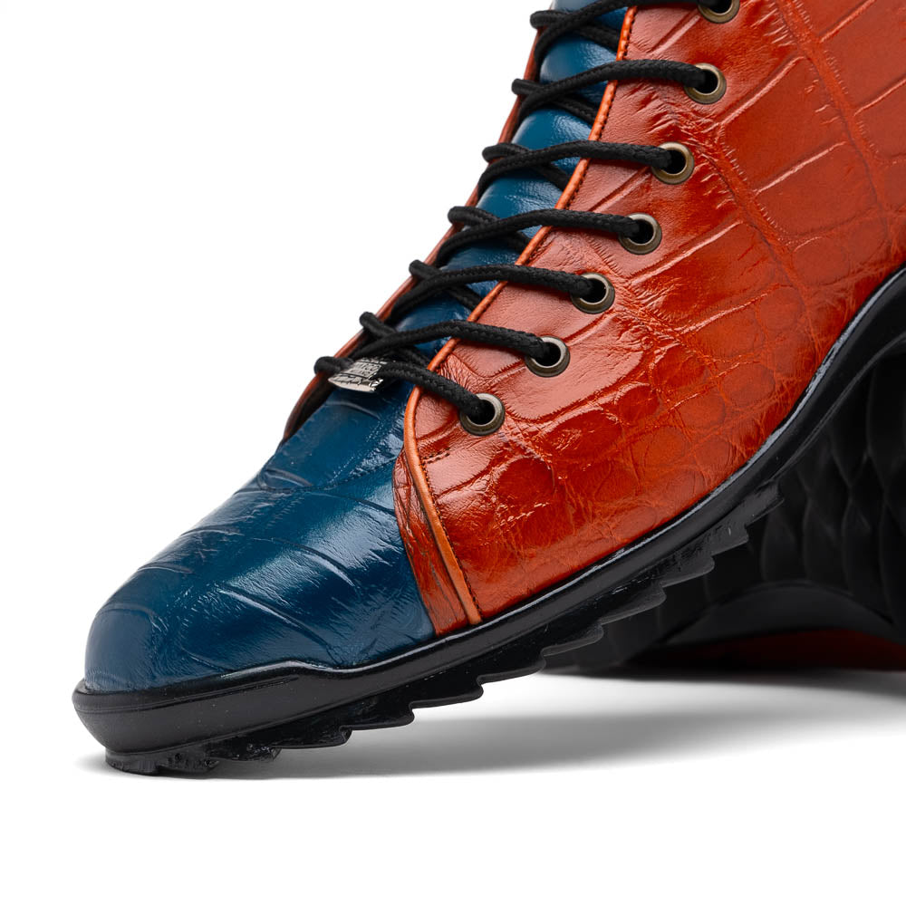 The Hermond Blue Jeans/Honey by Marco Di Milano is a luxury high-top with textured leather in orange and blue, black laces, metal eyelets, and a black rubber sole with unique hand-painted details.