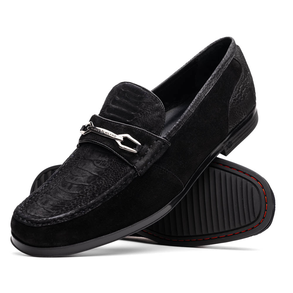A pair of Marco Di Milano Hugo Black sueded ostrich leg loafers with metal chain detailing and textured rubber soles, one upright and one on its side, display refined luxury craftsmanship.