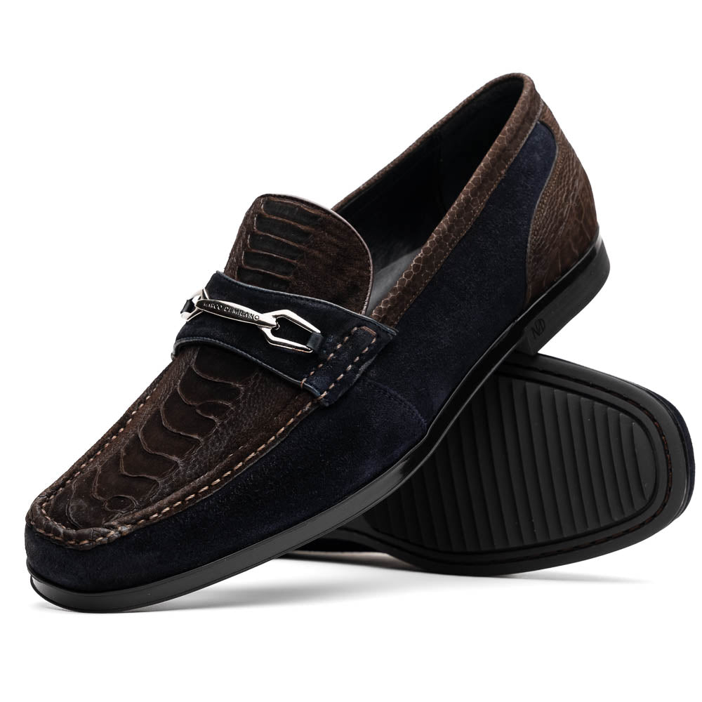 The Marco Di Milano Hugo Brown / Navy men's loafers feature dark brown textured leather, navy suede trim, a metal buckle detail, and black rubber soles for a luxurious look.