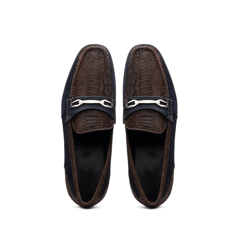 The Marco Di Milano Hugo Brown / Navy men's loafers feature dark brown textured leather, navy suede trim, a metal buckle detail, and black rubber soles for a luxurious look.
