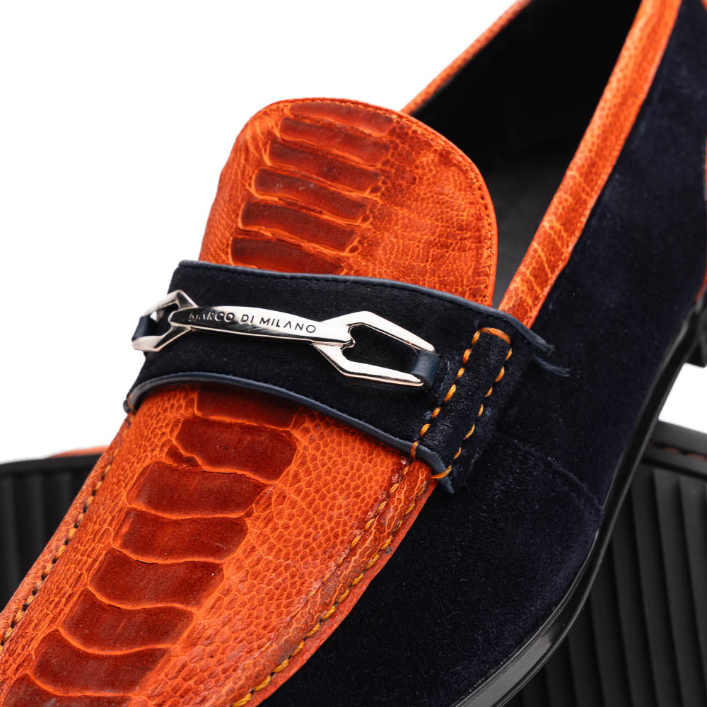 The Hugo Orange / Navy by Marco Di Milano is a men's loafer in orange crocodile-textured leather with navy suede accents, silver bit detail, and a black rubber sole with red stitching—ideal for luxury footwear fans.