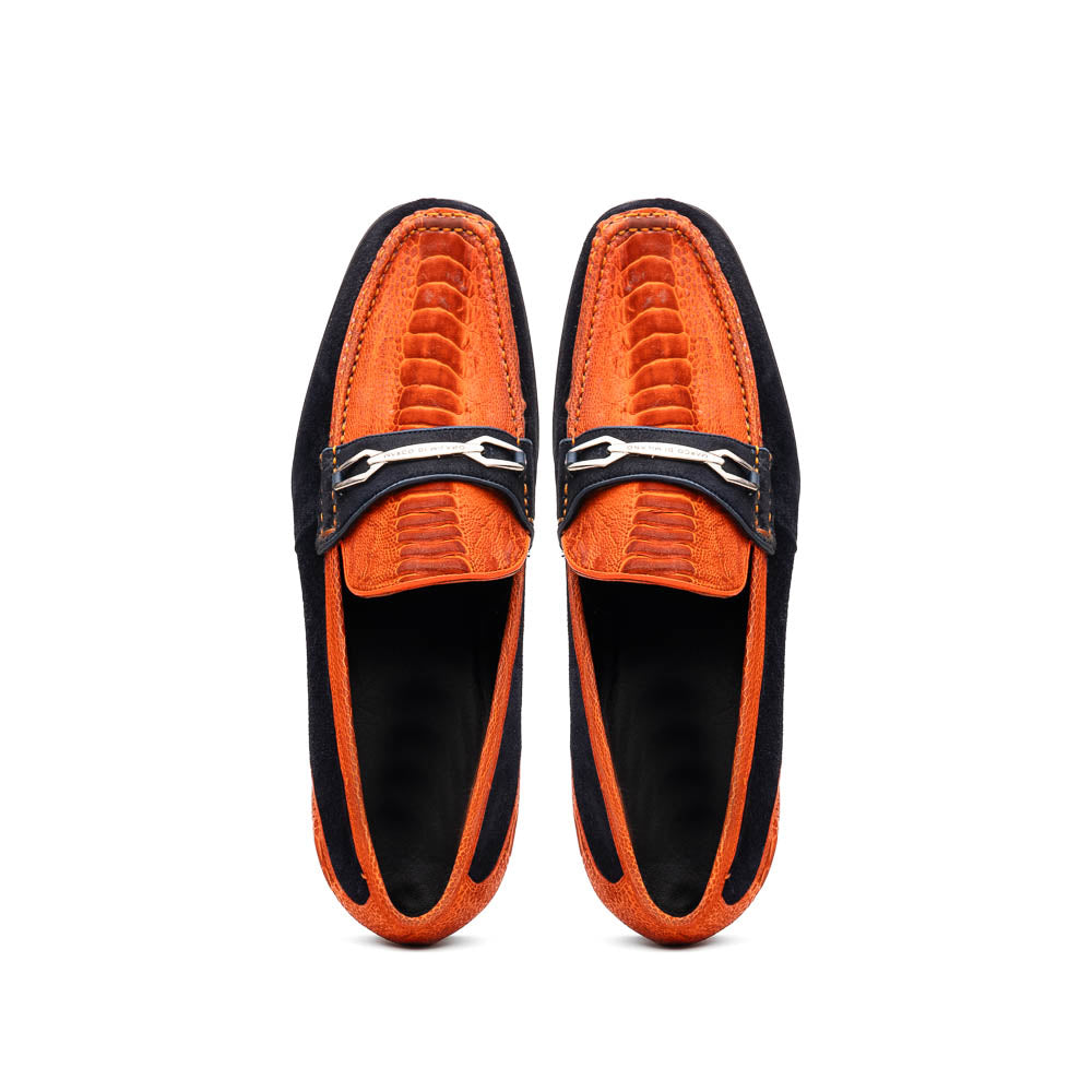 The Hugo Orange / Navy by Marco Di Milano is a men's loafer in orange crocodile-textured leather with navy suede accents, silver bit detail, and a black rubber sole with red stitching—ideal for luxury footwear fans.