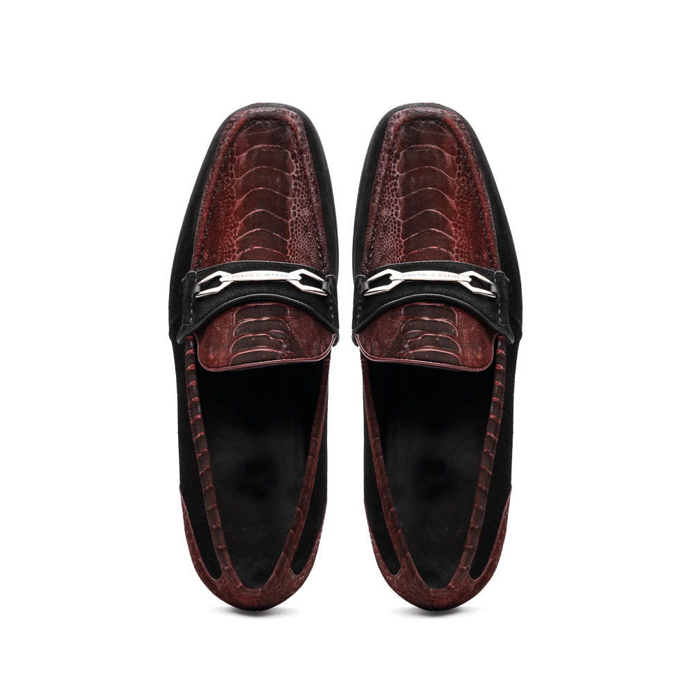 The Marco Di Milano Hugo Wine / Black men's loafers feature burgundy textured leather, black suede panels, metal buckles, and black rubber soles with red accents—luxury footwear for refined style.