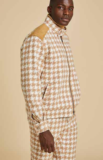 A bearded man wears the Inserch Wool Blend Houndstooth Full Zip Bomber Jacket in khaki over a white shirt, paired with regular-fit blue jeans and brown shoes, standing against a beige background.