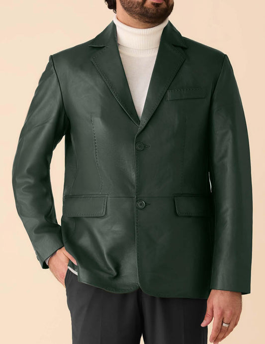 A man in an Inserch Leather Blazer 600-52 Pine over a white turtleneck and dark trousers stands against a beige background. The blazer features lamb leather and paisley print lining.