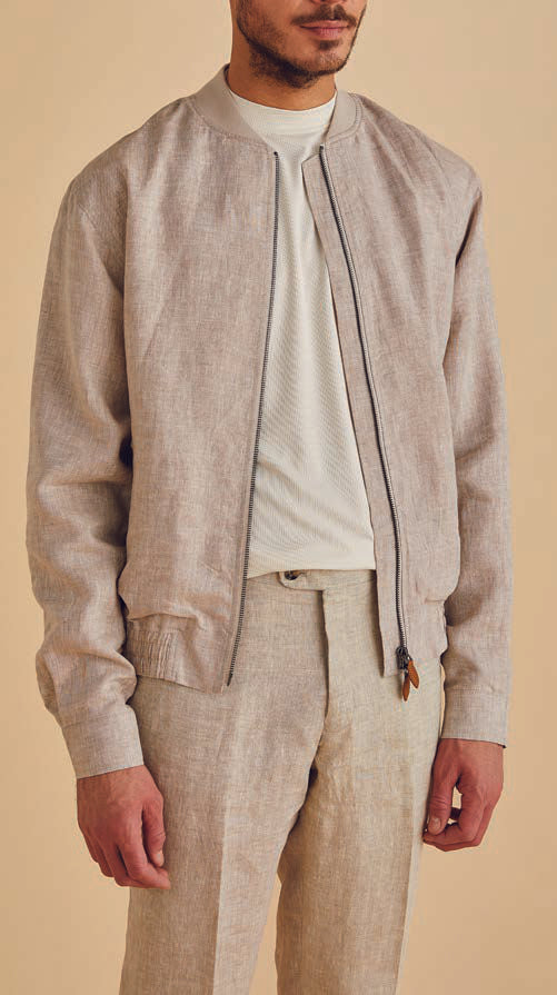 Close-up of the Inserch Premium Linen Short Zip Jacket JS660-02 in white, showcasing its subtle woven texture and refined barrel cuff that adds sophistication.