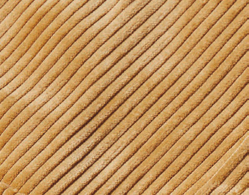 A person wearing the Inserch 4-Pocket Cord Suit BL267-09 Khaki with an adjustable back tab over a white turtleneck sweater.