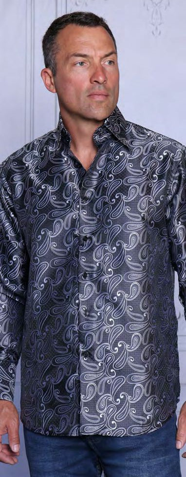 A man wearing the INSOMNIA MZT-209 Woven Satin Black Shirt by Insomnia and blue jeans stands in front of a light background.