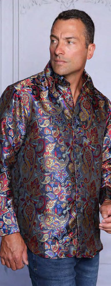 A man wearing an Insomnia INSOMNIA MZT-200 Poly/Rayon Satin Black Shirt and blue jeans stands in front of a light-colored wall, looking to his right.