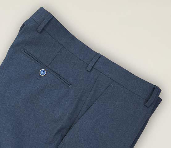 Close-up of the back of Inserch Denim Chino Pants P274-00010 Denim Blue, showcasing belt loops, a single welt pocket, and a blue button against a light background. These modern-fit pants by Inserch are crafted from a soft poly rayon blend for all-day comfort.