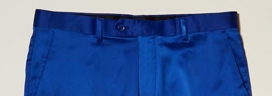 Close-up of the waistband and upper portion of the Inserch Stretch Satin Pants P3901-00013 in royal blue, featuring a slim fit, button closure, and belt loops, photographed against a neutral background.