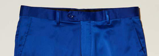 Close-up of the waistband and upper portion of the Inserch Stretch Satin Pants P3901-00013 in royal blue, featuring a slim fit, button closure, and belt loops, photographed against a neutral background.