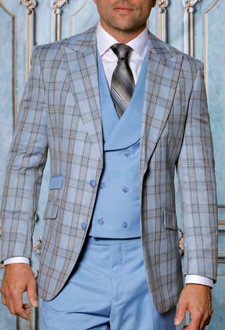 A man wearing the Insomnia INSOMNIA PARIS-6 3PC Compose Tailored Fit Sapphire Suit by Insomnia stands against a decorative blue background.