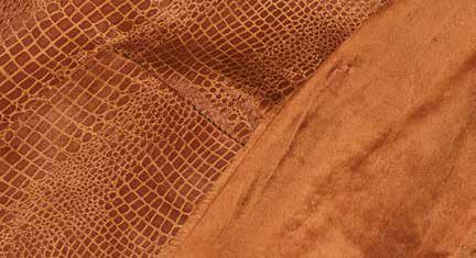 A man poses against a beige background, wearing the Inserch Sueded Snake Skin Embossed Jacket JS268-104 in a cognac hue, paired with a white shirt.