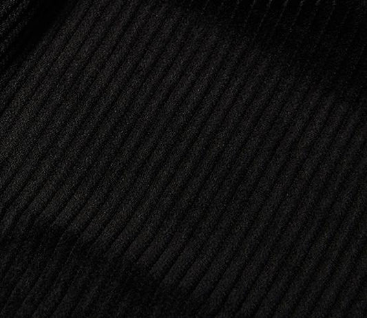 Close-up of Inserch Cotton Flat Front Corduroy Pants P3103-155 in Winter White, showcasing a ribbed fabric with diagonal lines that create a textured pattern, which is reminiscent of the sleek, modern fit seen in corduroy designs.