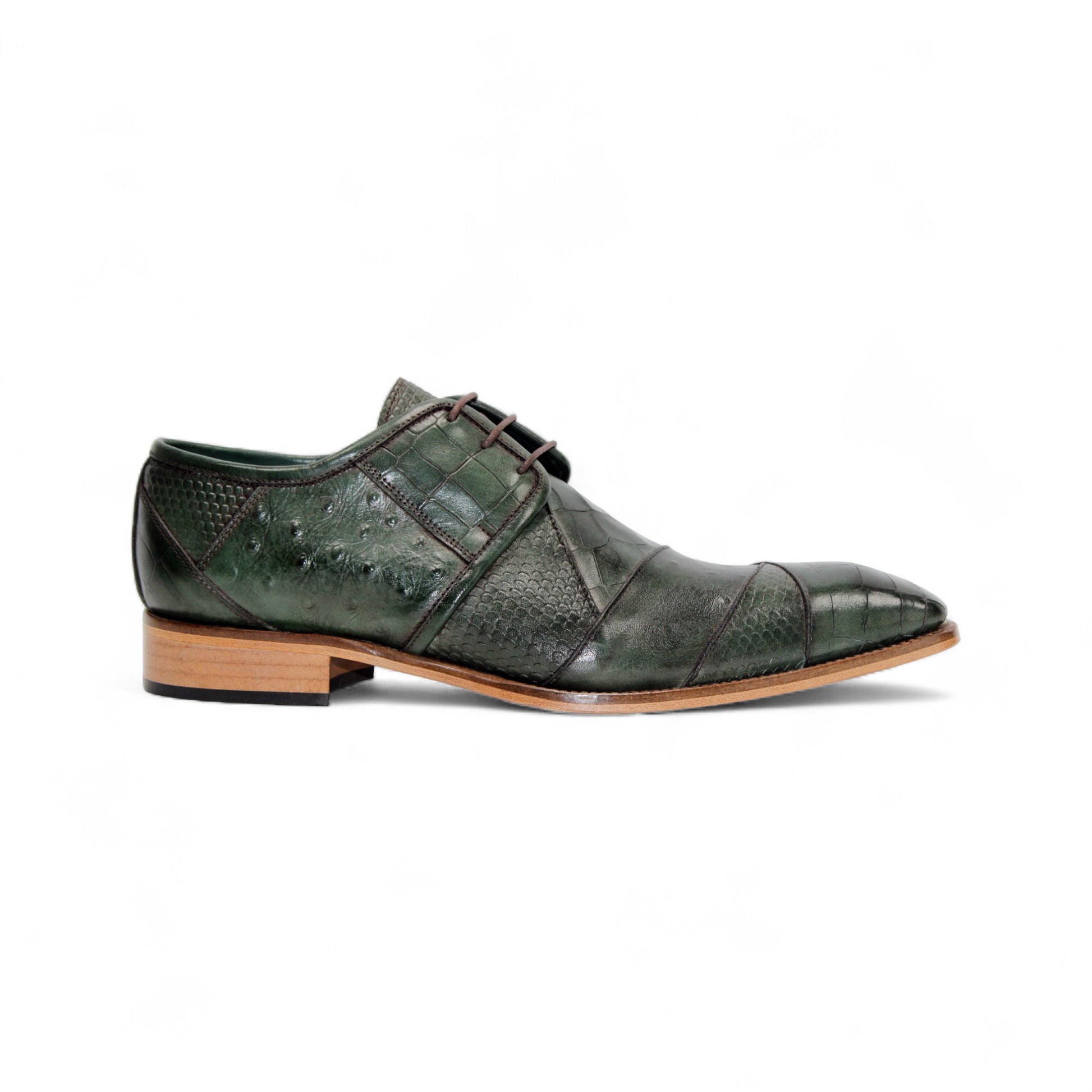 The Duca Imperio Green by Duca Di Matiste is an Italian-made dress shoe in green leather with a pointed toe, wooden sole, and textured pattern, shown in side profile against a white background.
