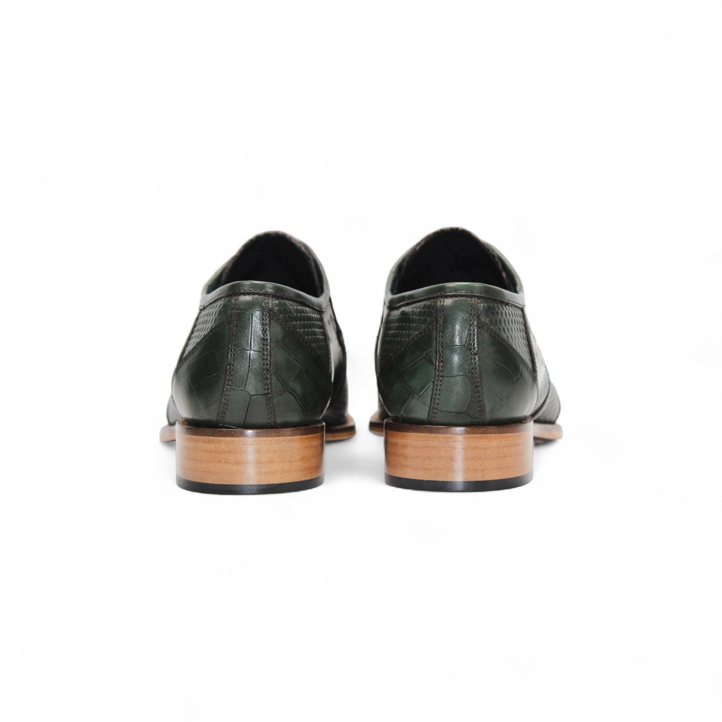 The Duca Imperio Green by Duca Di Matiste is an Italian-made dress shoe in green leather with a pointed toe, wooden sole, and textured pattern, shown in side profile against a white background.