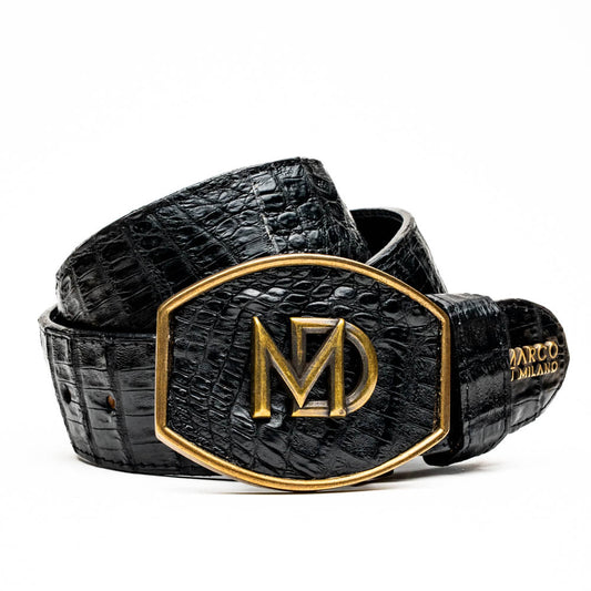 The Iowa Belt Black by Marco Di Milano is crafted from genuine black caiman skin with a crocodile texture, featuring a bold gold "MD" buckle and embossed branding—an eye-catching Western belt for any outfit.