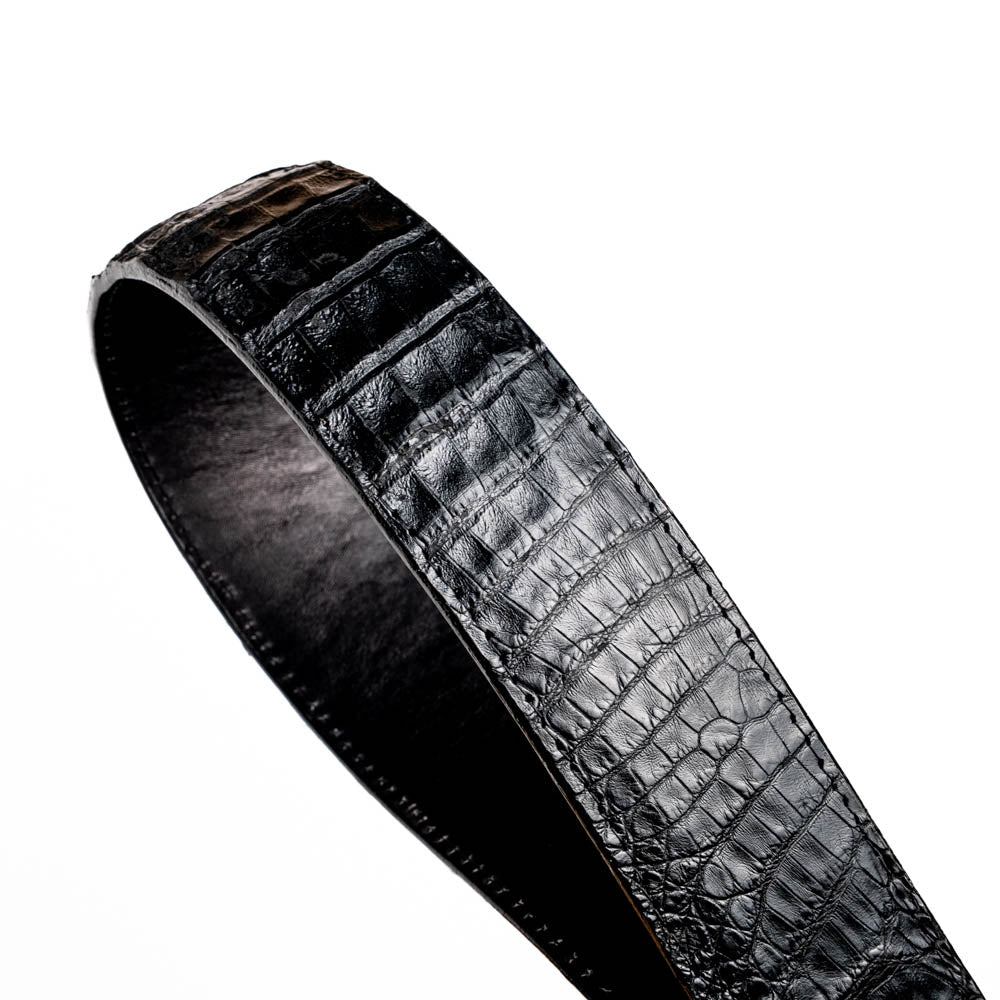 The Iowa Belt Black by Marco Di Milano is crafted from genuine black caiman skin with a crocodile texture, featuring a bold gold "MD" buckle and embossed branding—an eye-catching Western belt for any outfit.
