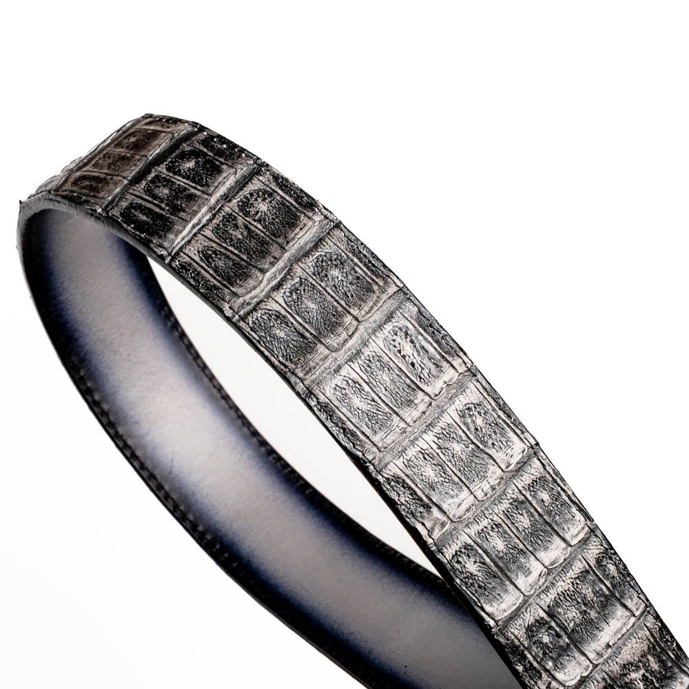 The Marco Di Milano Iowa Belt Stone Gray features genuine caiman skin and a bold gold "MD" buckle on a textured background, combining luxury with standout Western style.