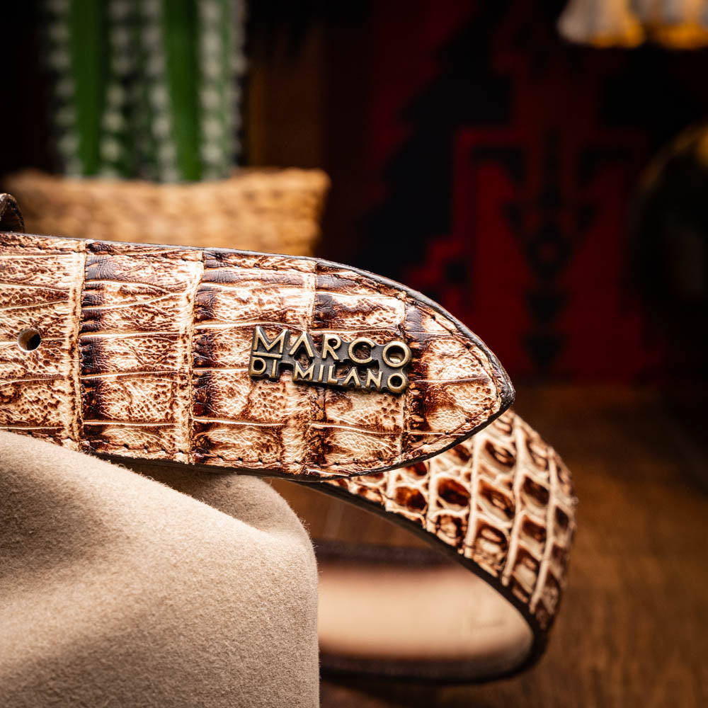 The Iowa Belt Stone Orix by Marco Di Milano features brown genuine crocodile leather, a gold "MD" buckle, and "Marco Di Milano" branding on the strap.