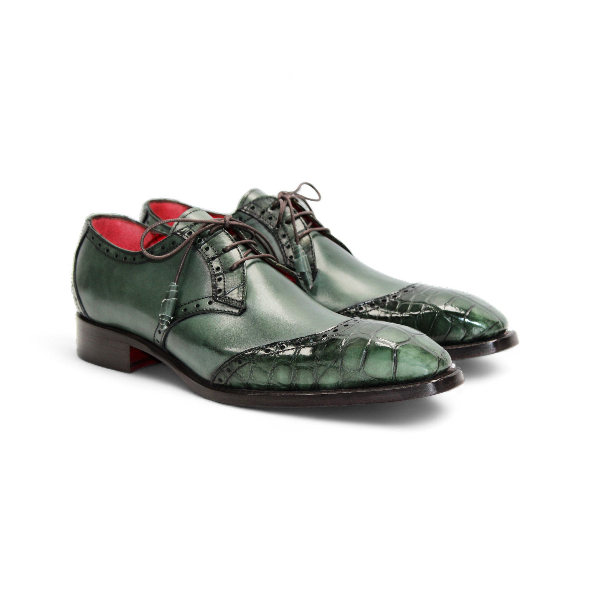 The Fennix Jax Green by Fennix of Italy is a green luxury leather dress shoe with brogued detailing, laces, and a low wooden heel, reflecting Italian craftsmanship and shown in profile against a white background.