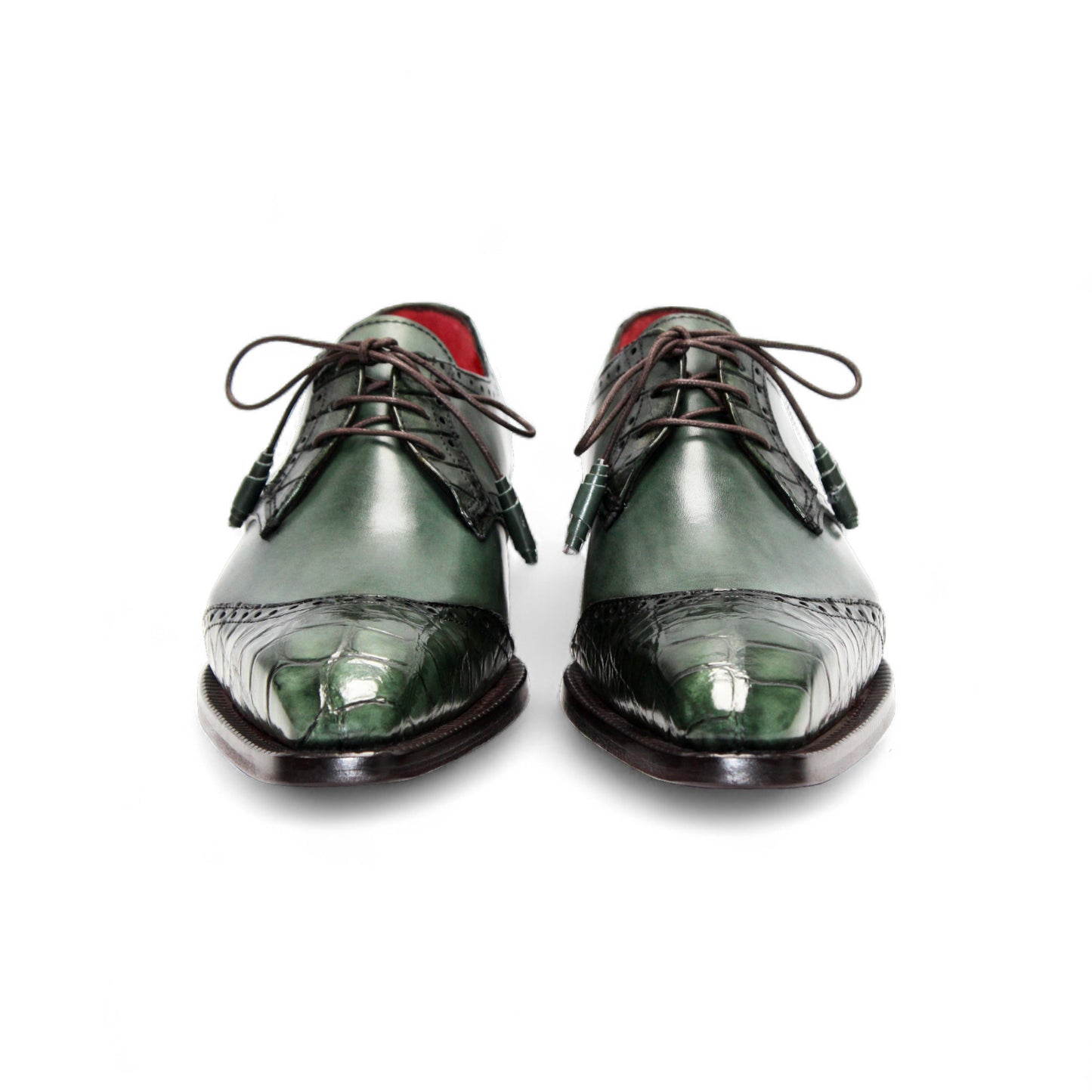 The Fennix Jax Green by Fennix of Italy is a green luxury leather dress shoe with brogued detailing, laces, and a low wooden heel, reflecting Italian craftsmanship and shown in profile against a white background.