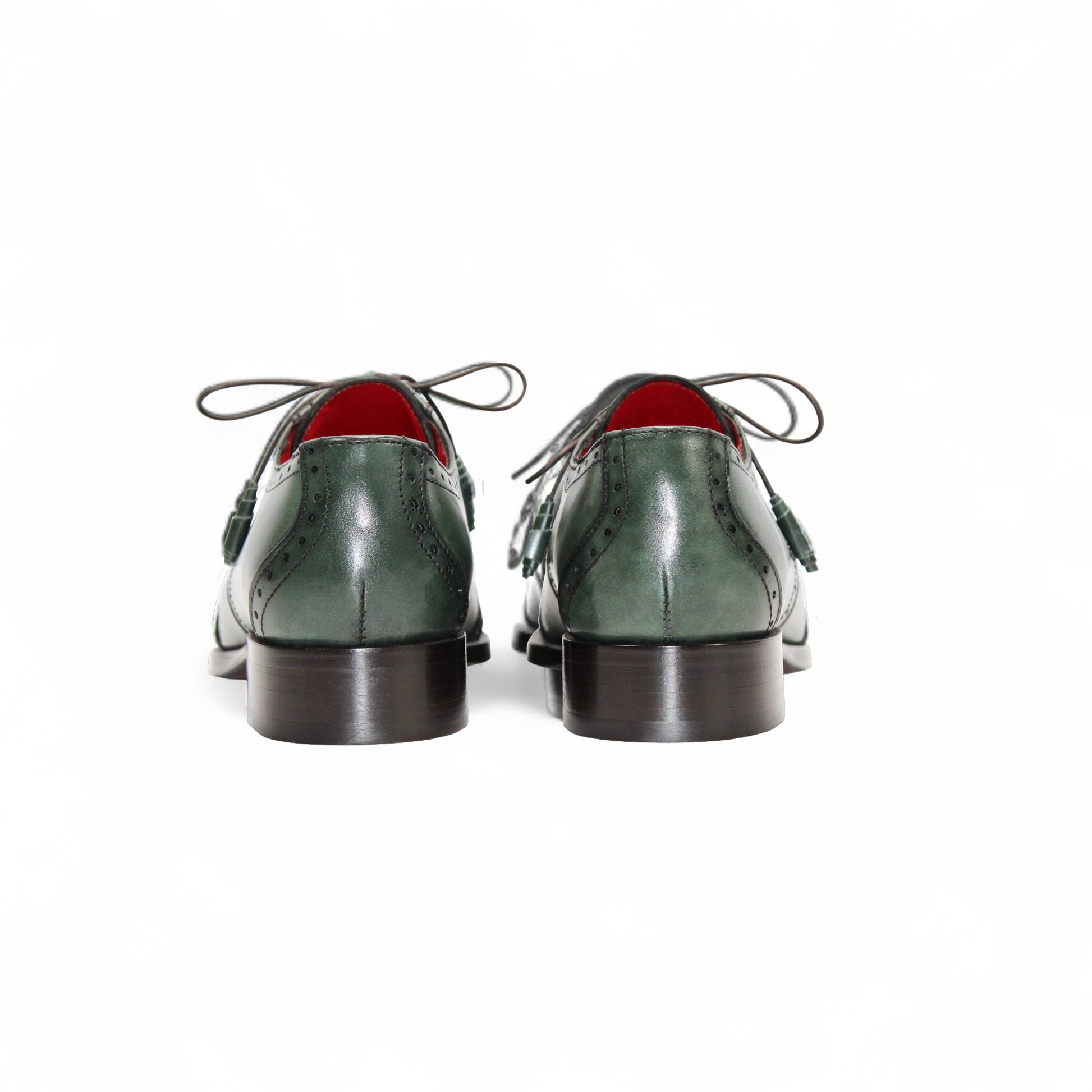 The Fennix Jax Green by Fennix of Italy is a green luxury leather dress shoe with brogued detailing, laces, and a low wooden heel, reflecting Italian craftsmanship and shown in profile against a white background.