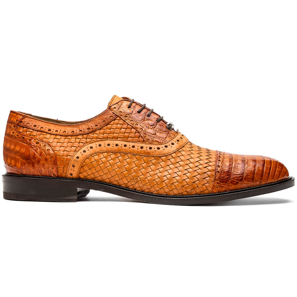 The John Brandy by Marco Di Milano is a pair of brown men’s oxford dress shoes with woven and textured leather, black laces, and stitched leather soles—ideal for those seeking luxury footwear.