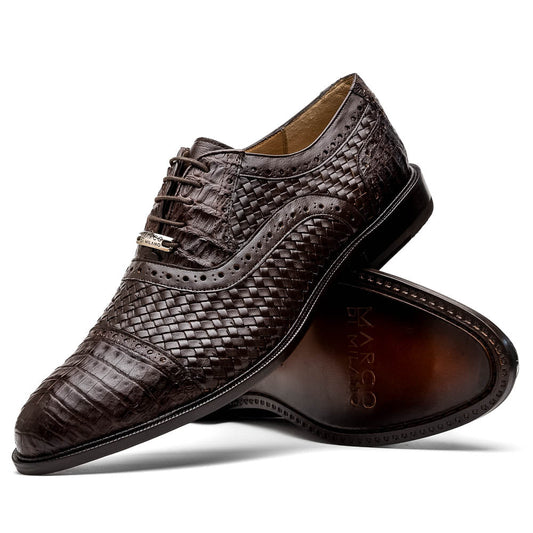 A pair of John Brown luxury dress oxfords by Marco Di Milano in brown woven calfskin leather with brogue detailing; one shoe upright, the other displays the sole and "Marco Di Milano" branding.