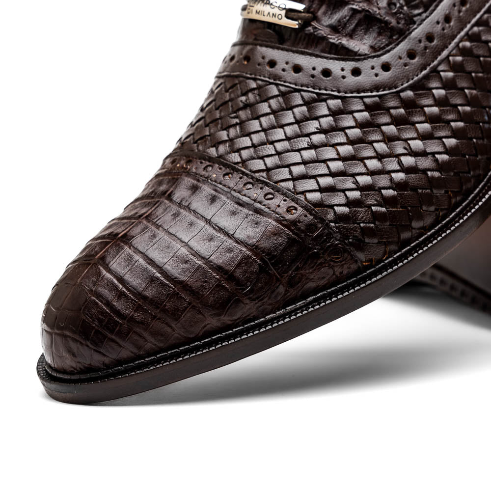 A pair of John Brown luxury dress oxfords by Marco Di Milano in brown woven calfskin leather with brogue detailing; one shoe upright, the other displays the sole and "Marco Di Milano" branding.