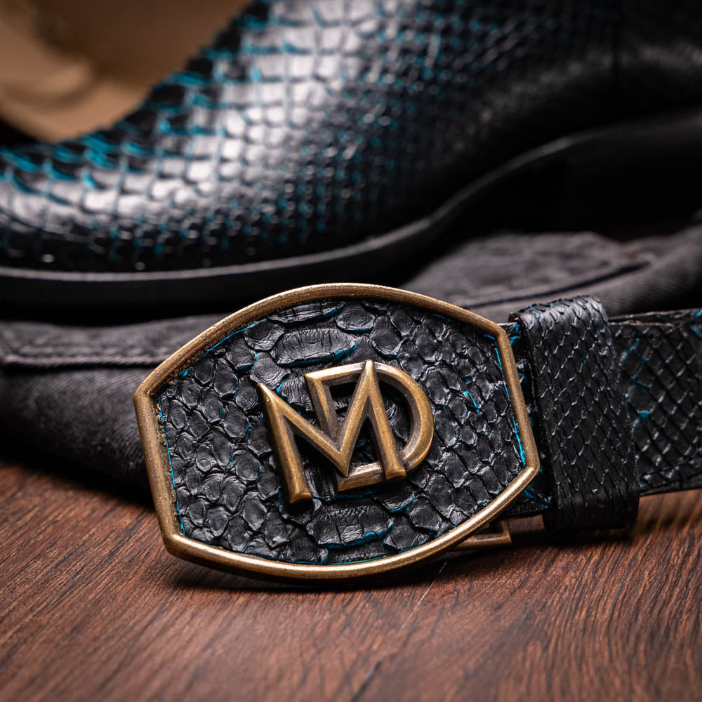 The Marco Di Milano Kansas Black / Blue boots feature black leather with blue stitching, a snakeskin texture, and branded soles—a luxurious handcrafted pair designed to stand out.